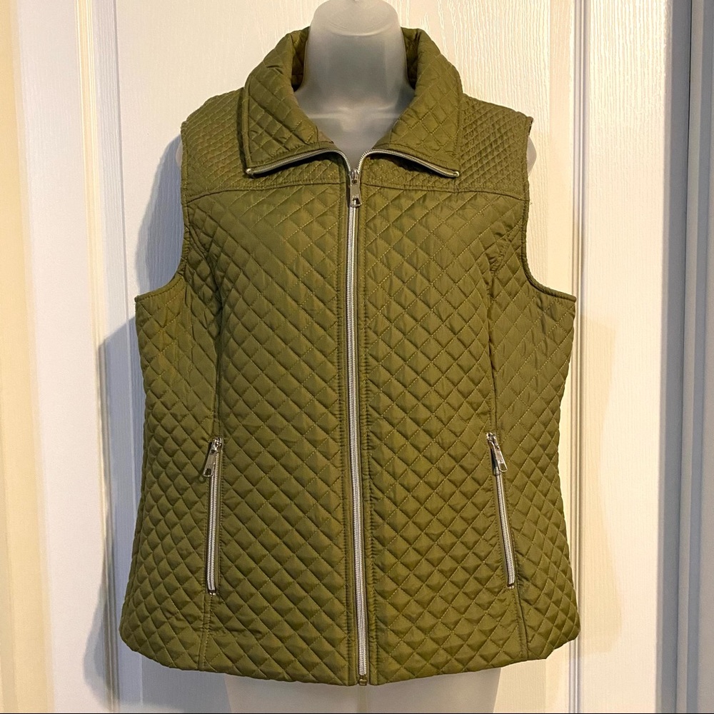 Olive green vest, with silver zipper accents